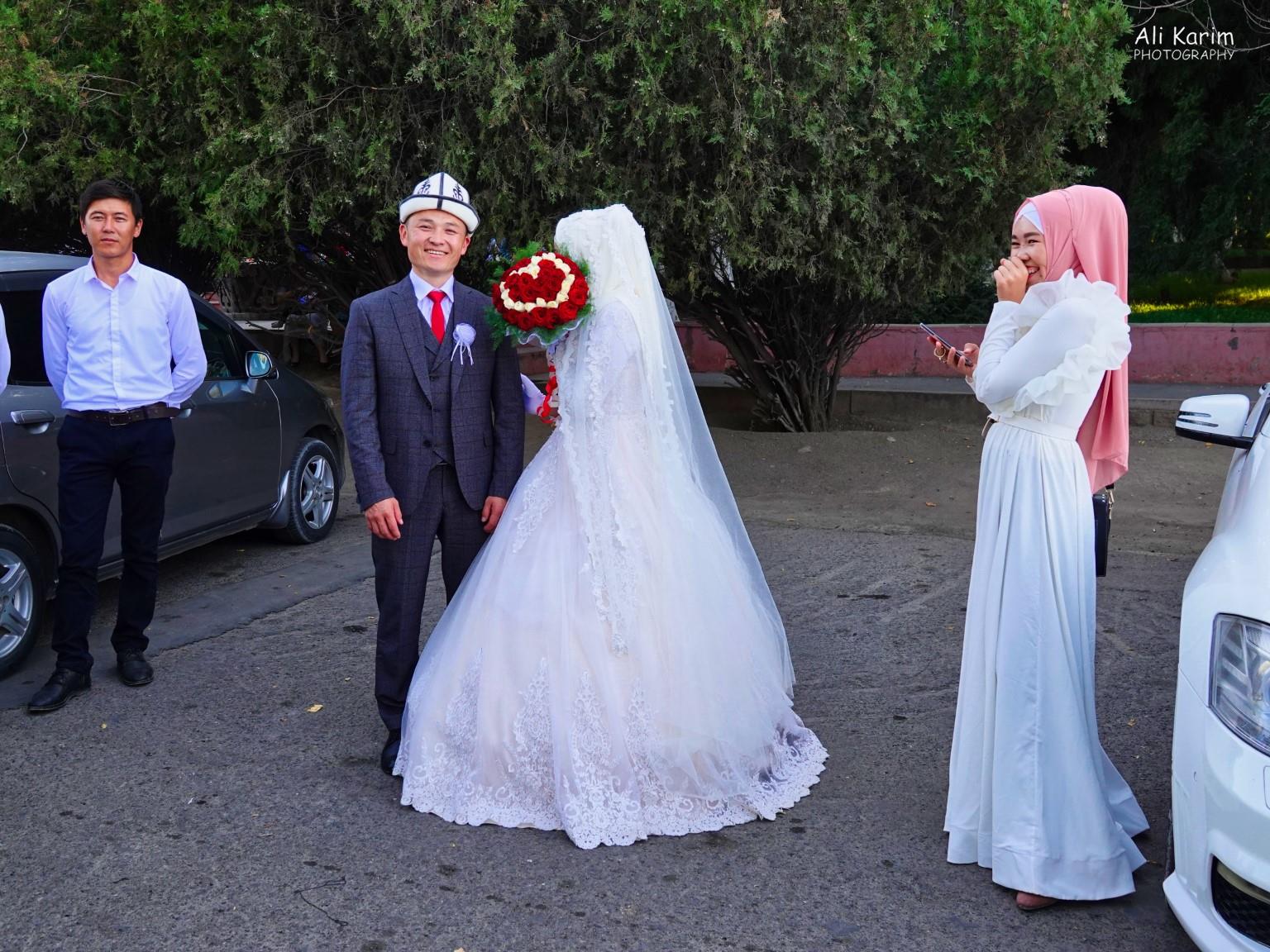 Wedding 2; this bride was very shy; note bridesmaid having a good giggle at her Silk Road 15: Osh, Kyrgyzstan Wedding 2; this bride was very shy; note bridesmaid having a good giggle at her