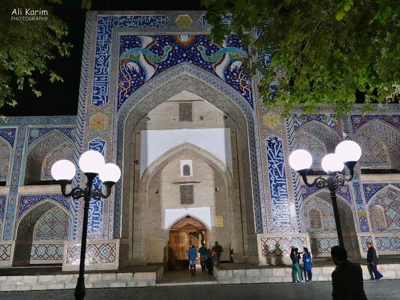 The 16th Century Nadir Divan-Beghi Madrasah in the north end of the main square, just outside out hotel. Note the intricate mosaic tilework at the top of the archway, of the Simurgh, a mythical Persian bird, a symbol of benevolence and fertility Bukhara, Oct 2019, The 16th Century Nadir Divan-Beghi Madrasah in the north end of the main square, just outside out hotel. Note the intricate mosaic tilework at the top of the archway, of the Simurgh, a mythical Persian bird, a symbol of benevolence and fertility