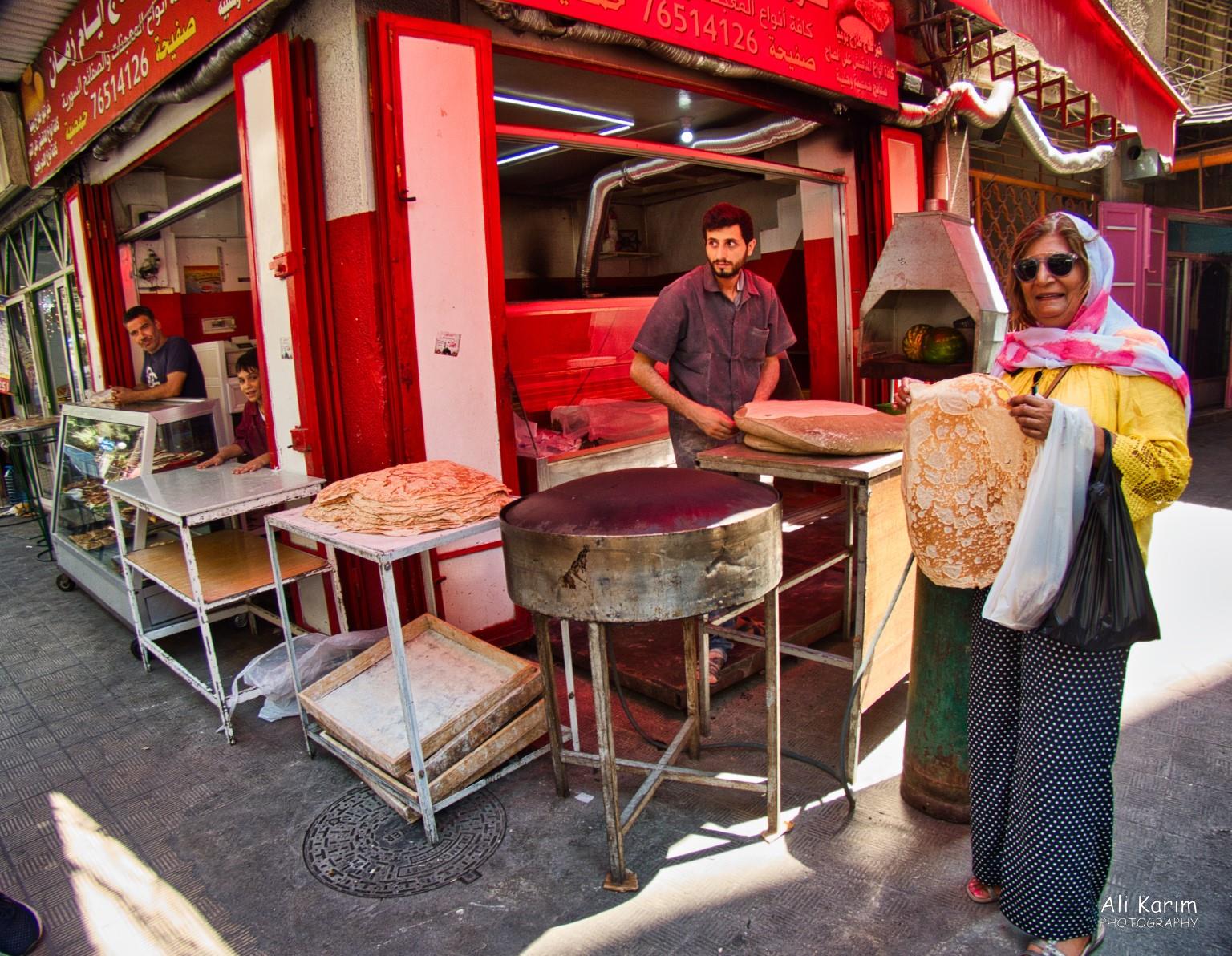 Had to try this very thin flatbread, freshly baked by this young man, who informed us he was a refugee from Syria Tripoli Lebanon Had to try this very thin flatbread, freshly baked by this young man, who informed us he was a refugee from Syria