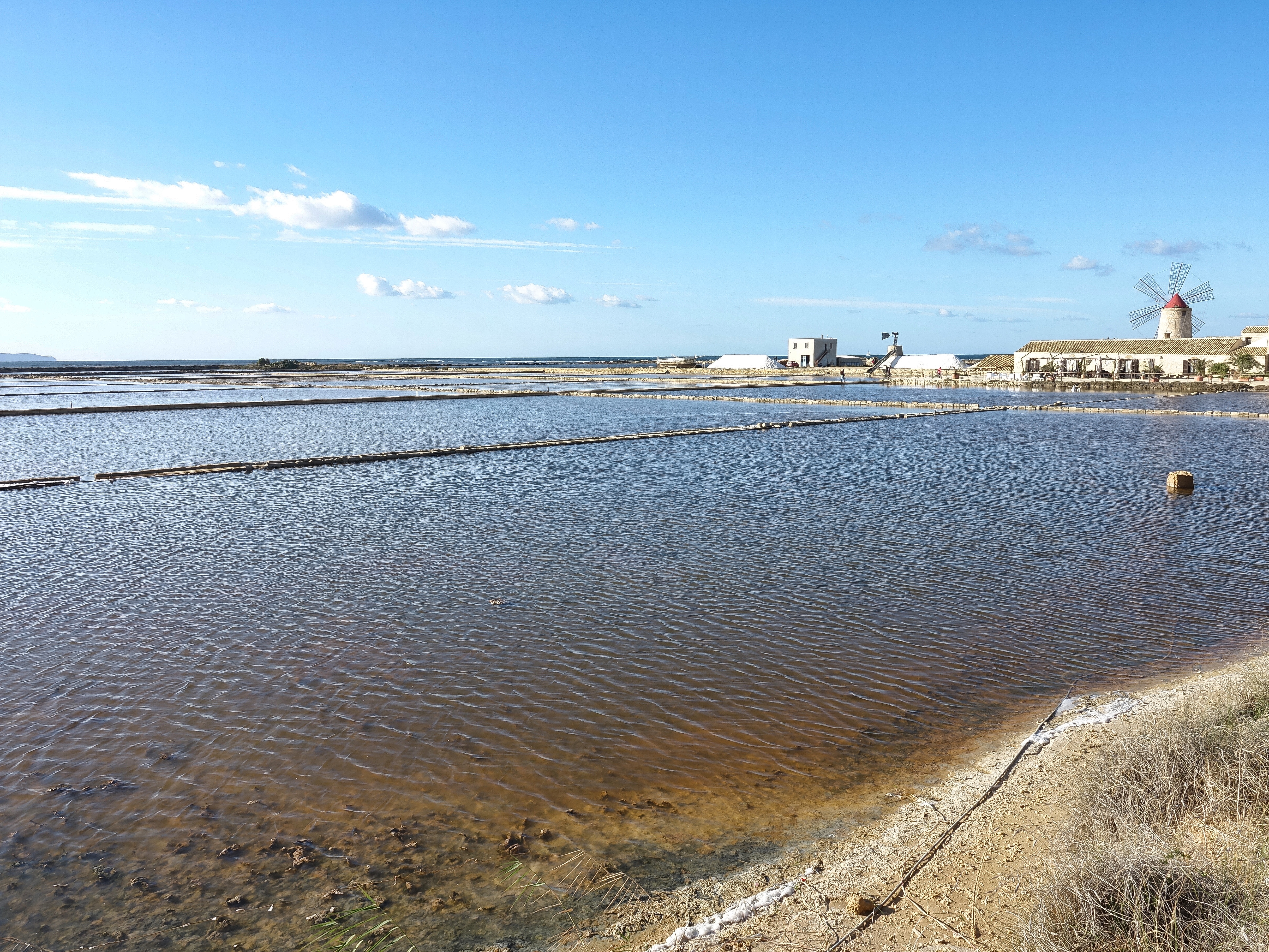 Salt water ponds filed by windmill power