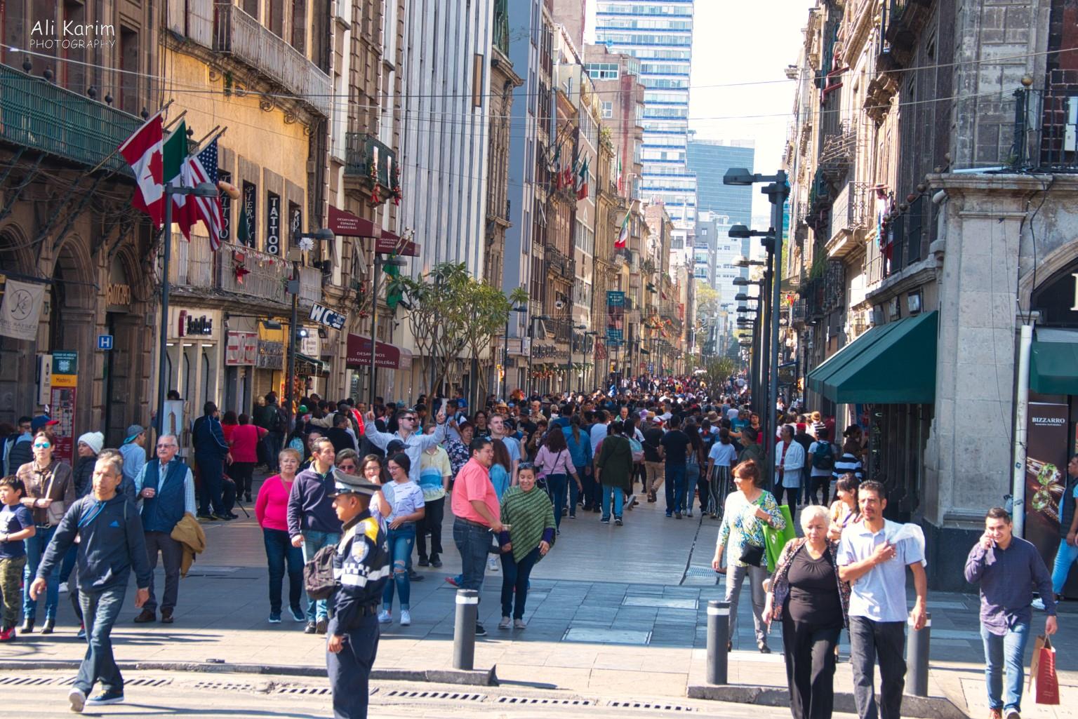 Mexico City, Mexico, Dec 2019, Busy pedestrian street leading to the Plaza de la Constitución (or Zocalo)