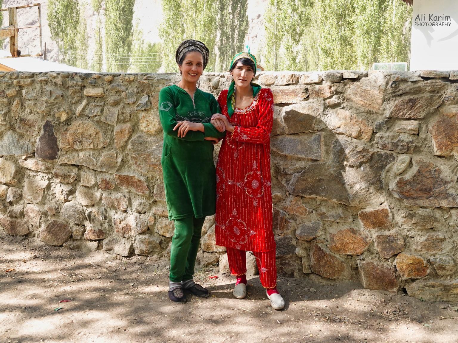 Friendly pamiri ladies nicely dressed in red and green Onto Khorog, Tajikistan, Friendly pamiri ladies nicely dressed in red and green
