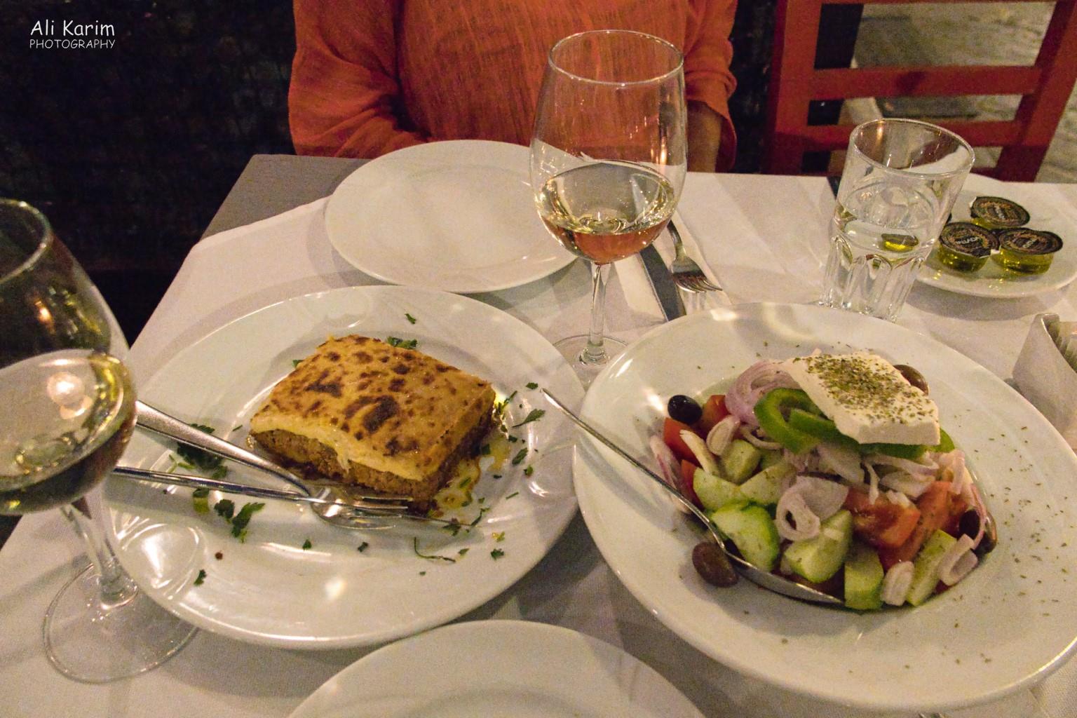 Athens, Greece, June, 2021, Greek salad and moussaka for dinner. Food was always very good everywhere
