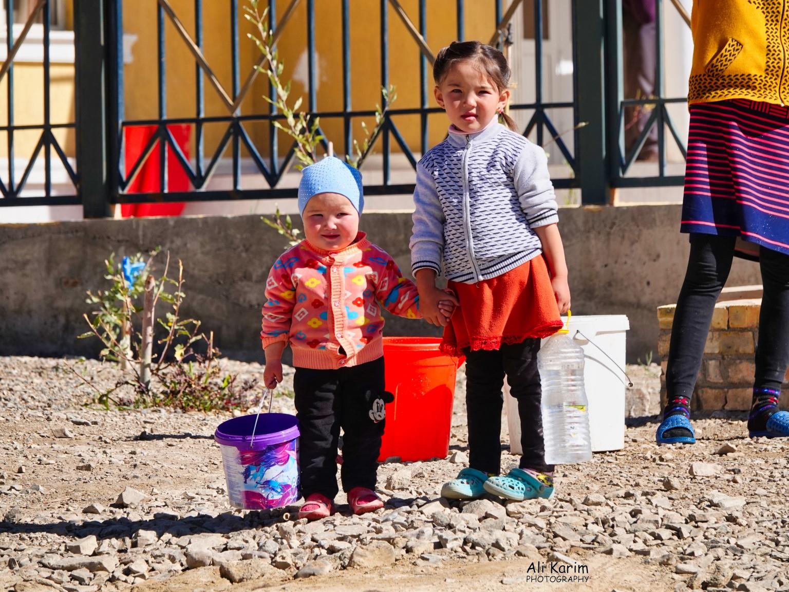 Little ones in the family pitch in to help collect water More Murghab & Alichur, Tajikistan, Little ones in the family pitch in to help collect water
