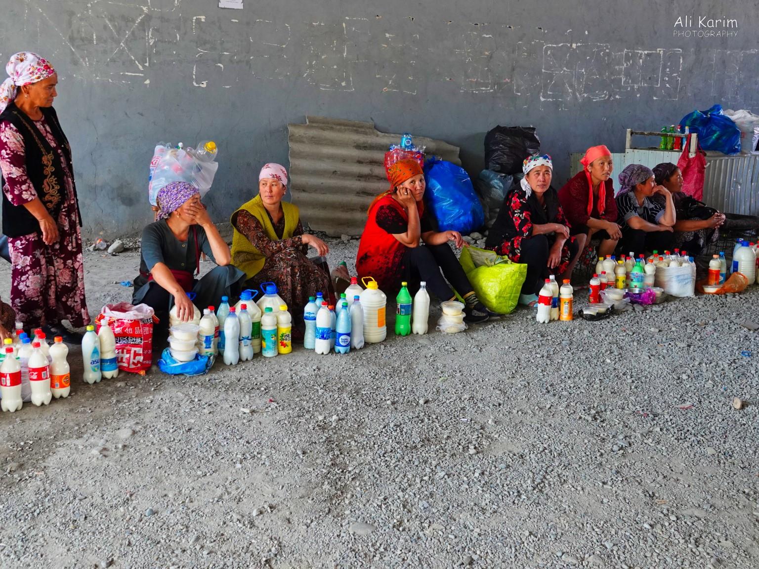 Ladies selling milk products at one entrance of the Jayma Bazaar Silk Road 16: More Osh, Kyrgyzstan Ladies selling milk products at one entrance of the Jayma Bazaar
