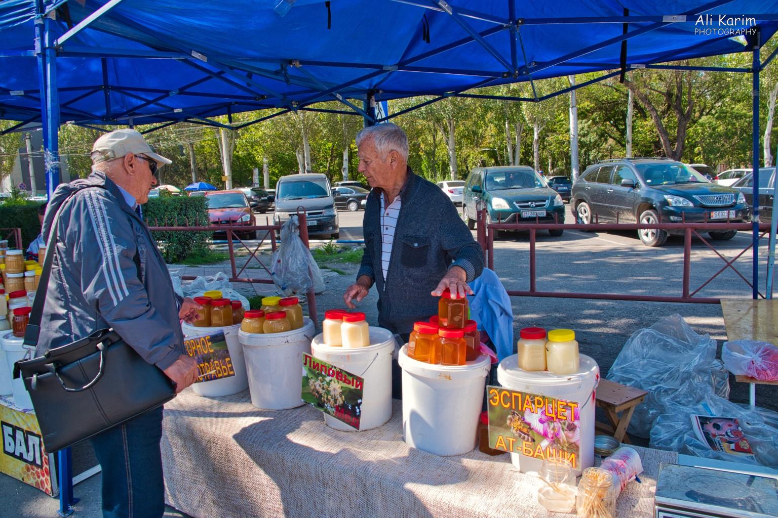 Stands selling local and Russian honeys; from different flowers, giving their honey unique tastes and textures. The vendors allowed everyone to taste-test their honeys. Silk Road 14 Bishkek Stands selling local and Russian honeys; from different flowers, giving their honey unique tastes and textures. The vendors allowed everyone to taste-test their honeys.