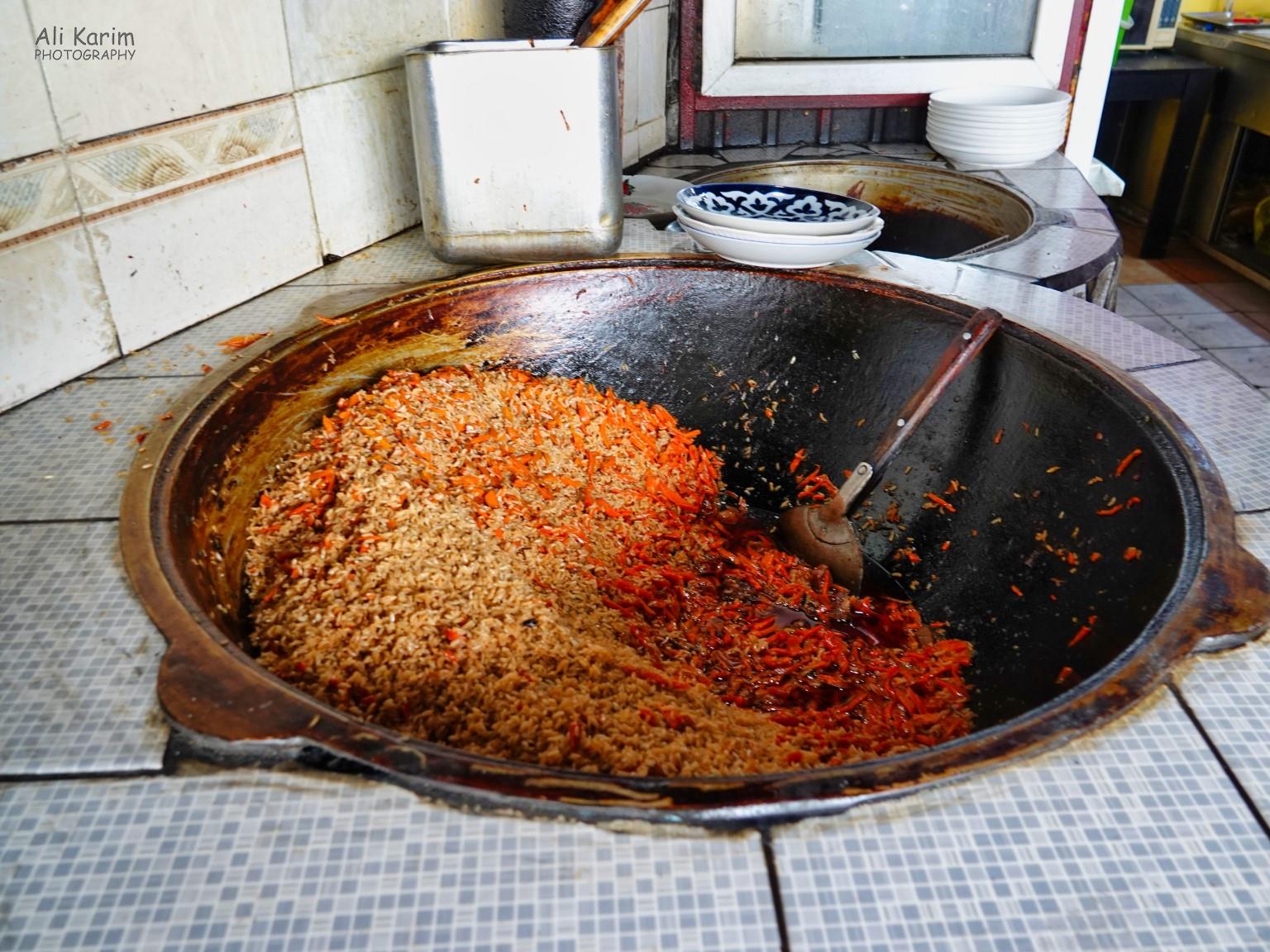 Plov, the national dish, was on sell in open air restaurants inside Korvon market More Dushanbe, Tajikistan Plov, the national dish, was on sell in open air restaurants inside Korvon market