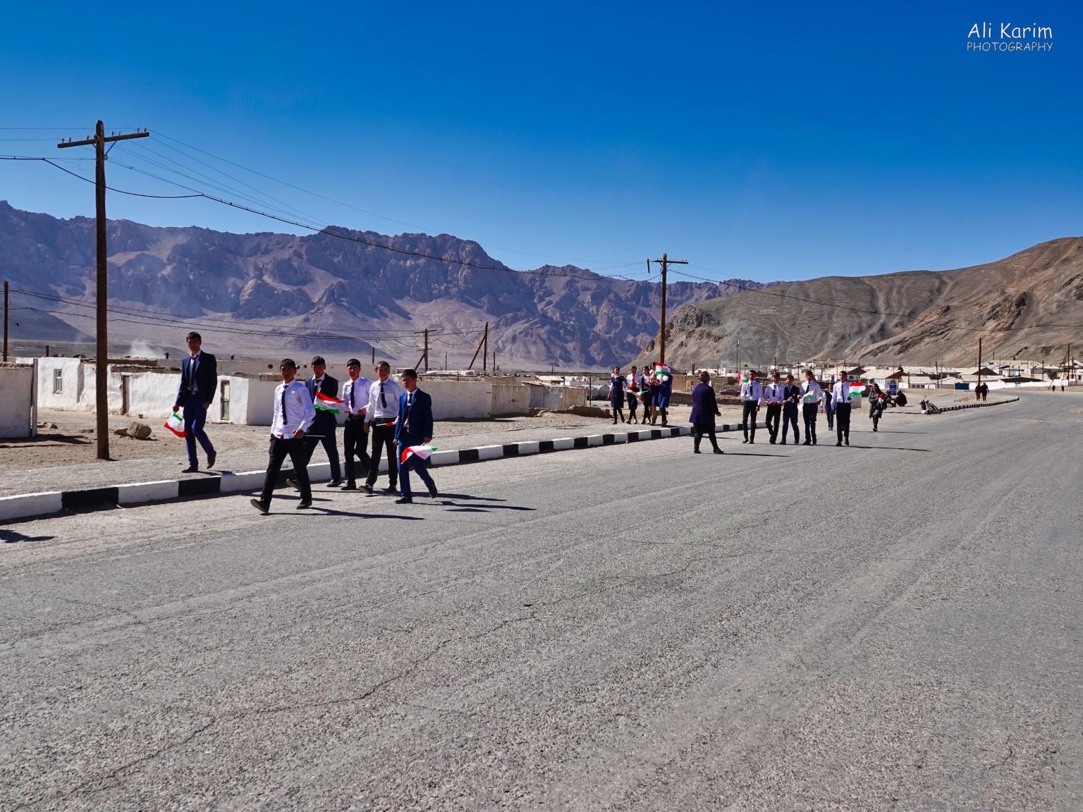School kids out on a break; all in nice uniforms. Unfortunately, we did not have time to stop and talk to them More Murghab & Alichur, Tajikistan, School kids out on a break; all in nice uniforms. Unfortunately, we did not have time to stop and talk to them