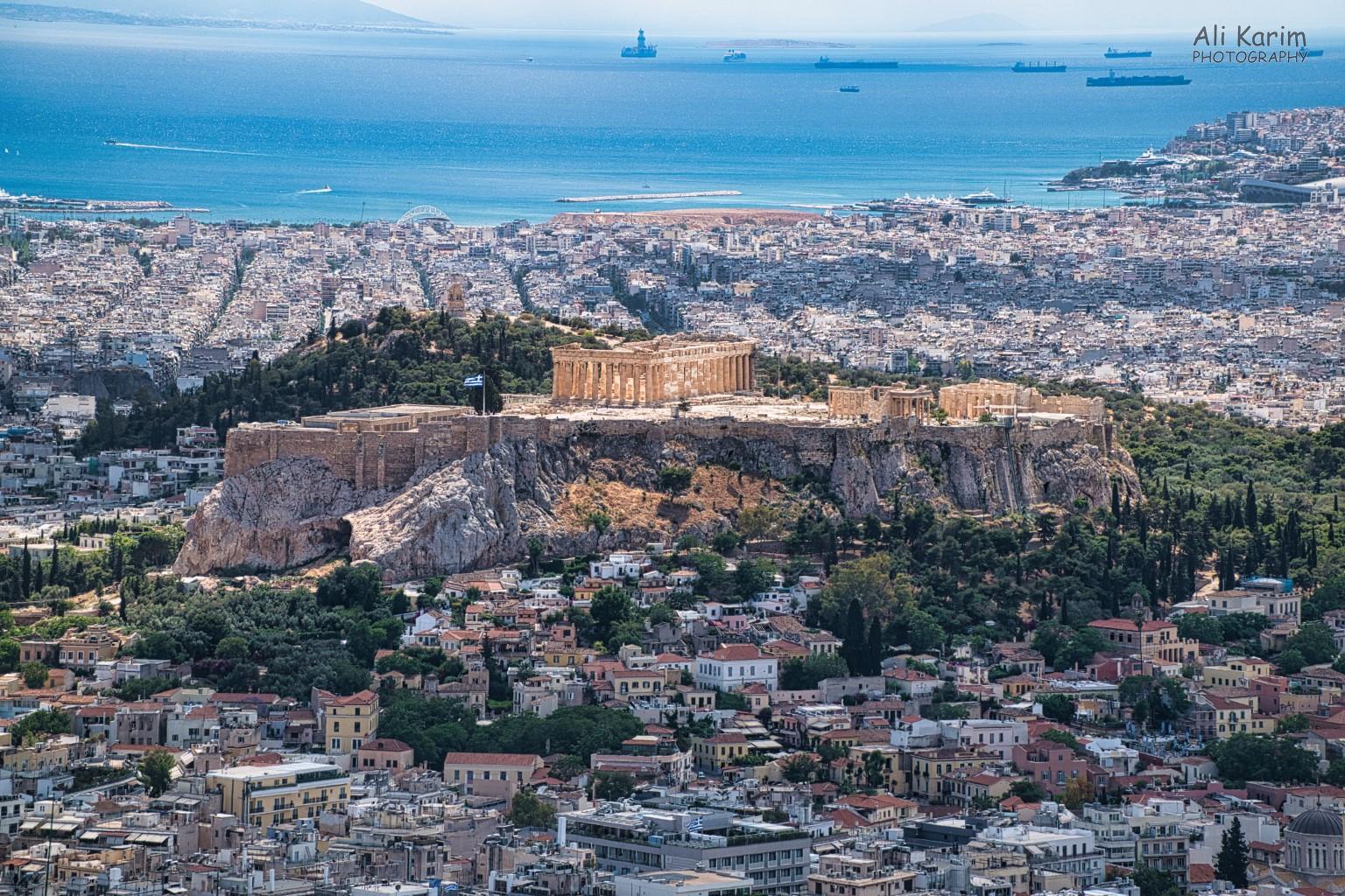 More Athens, Greece, May 2021, Breathtaking view of the Acropolis, Parthenon, the city of Athens, and the Aegean Sea