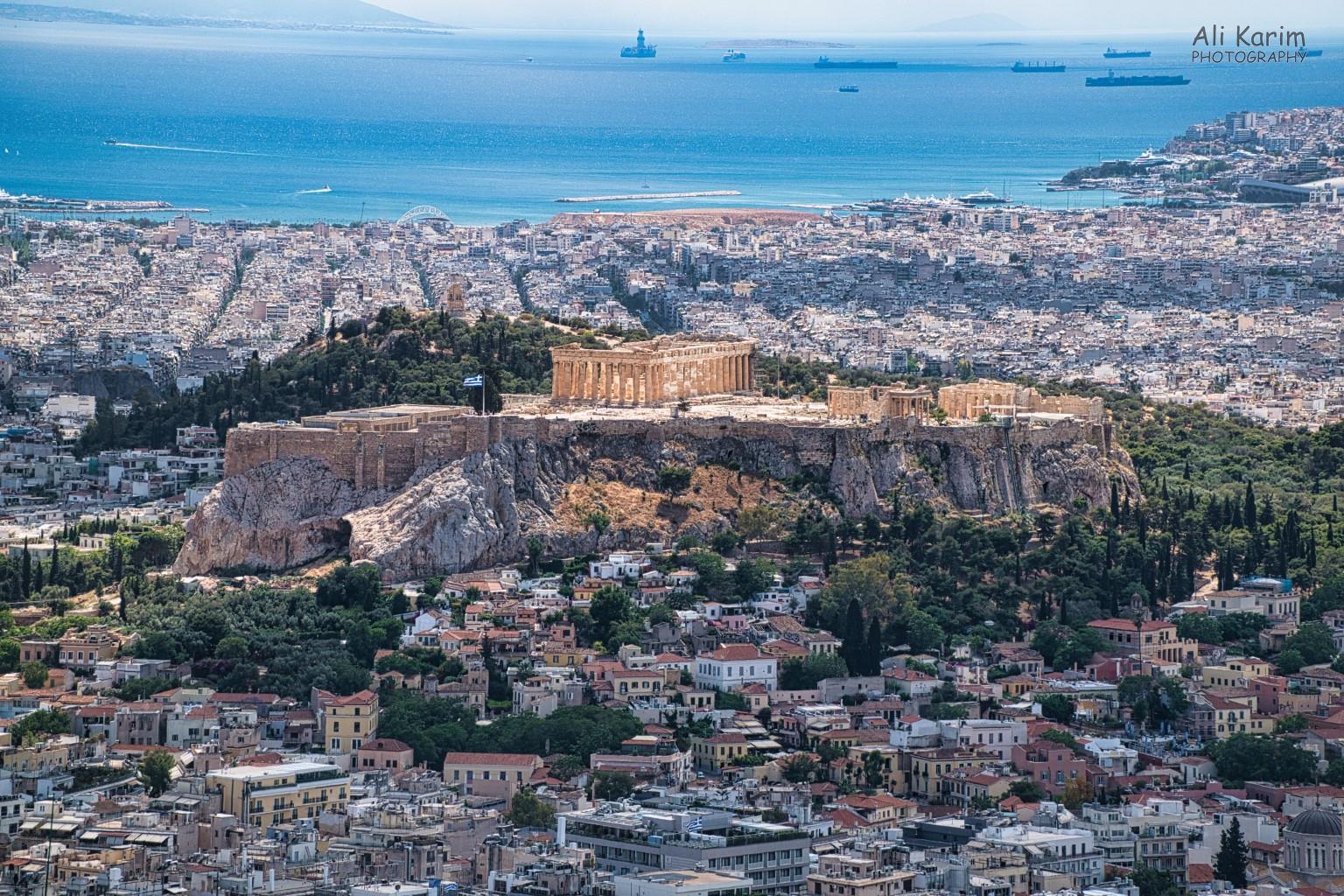 Breathtaking view of the Acropolis, Parthenon, the city of Athens, and the Aegean Sea More Athens, Greece, May 2021, Breathtaking view of the Acropolis, Parthenon, the city of Athens, and the Aegean Sea
